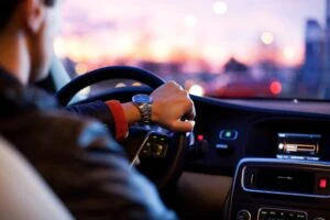 A person driving their car